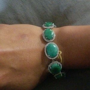 Platinum plated silver and Emerald bracelet